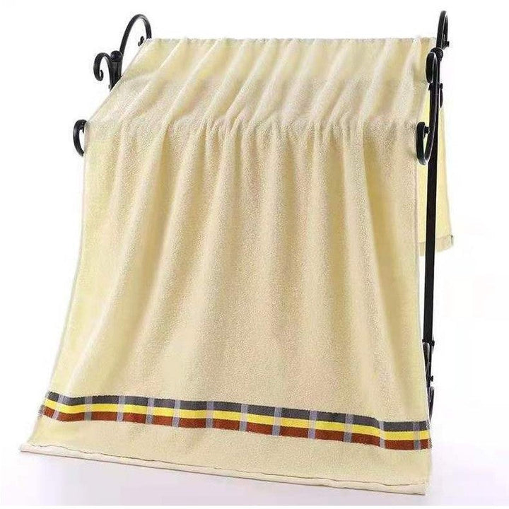 Women’s terry bath towel with elegant striped border Kalsten