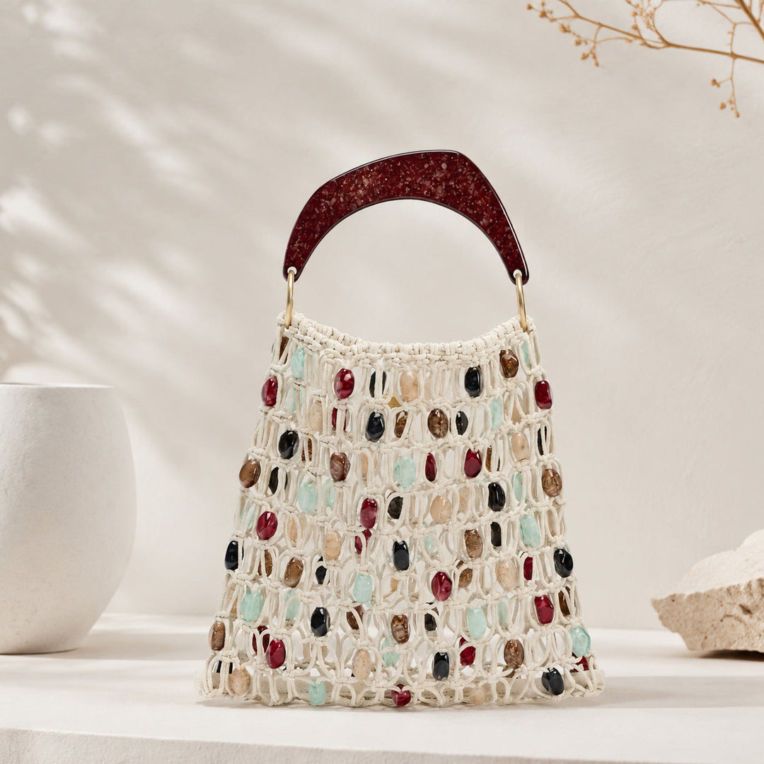 Handcrafted designer shoulder bag with unique stone accents Kalsten