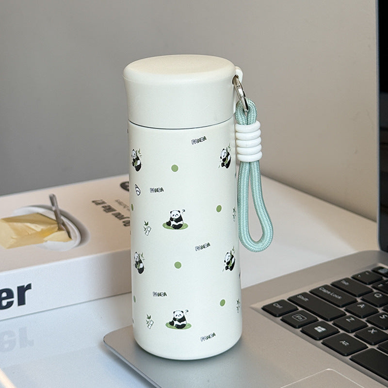 Women’s insulated drinking bottle with practical carrying strap and playful design Kalsten