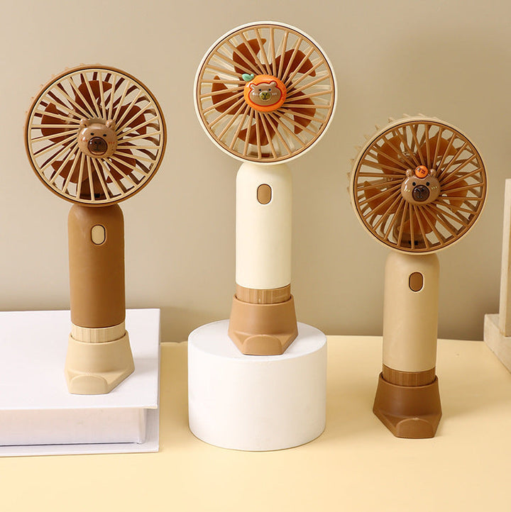 Cooling portable rechargeable handheld mini fan with detachable base stand cute animal-face safety grille USB-C charging Kalsten