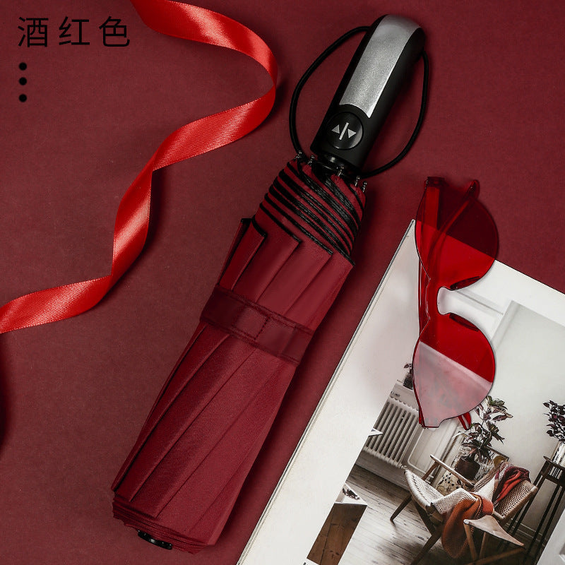Women's foldable umbrella with 12 sturdy ribs and elegant design Kalsten