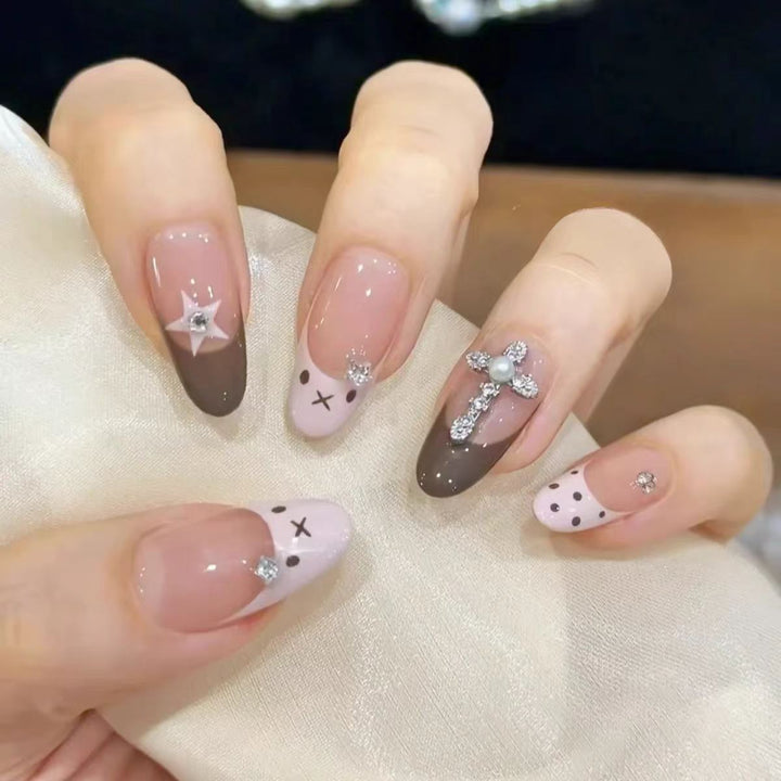 Artificial nails with creative design and sparkling accents Kalsten