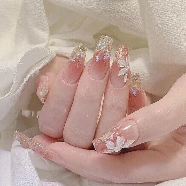Glamorous artificial nails with moon and star motif Kalsten