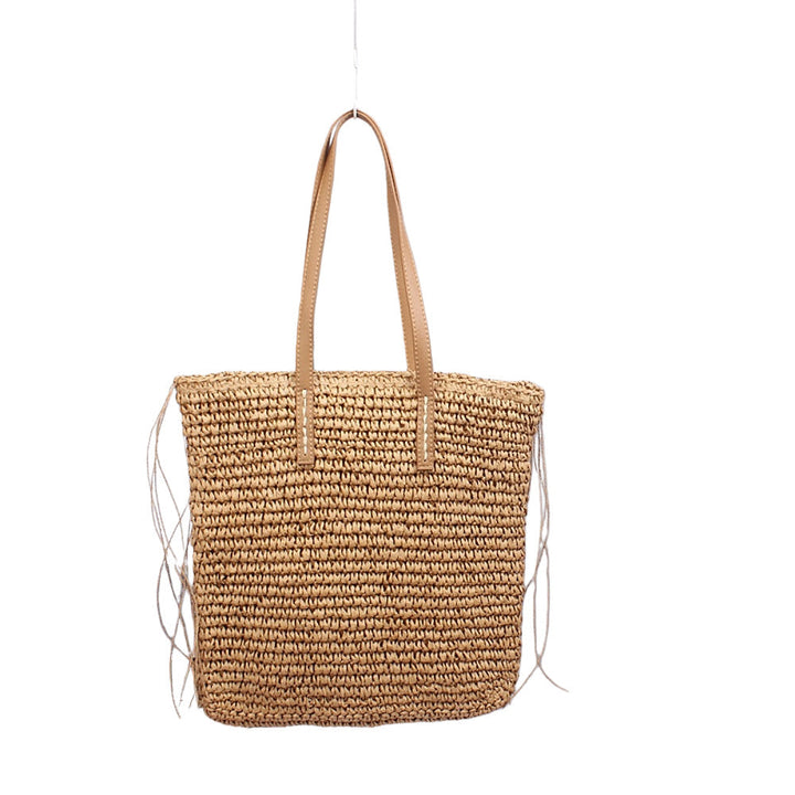 Handwoven beach bag made of natural materials with leather accents Kalsten