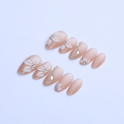 Artificial nail set with elegant flower designs and shimmering accents Acalora