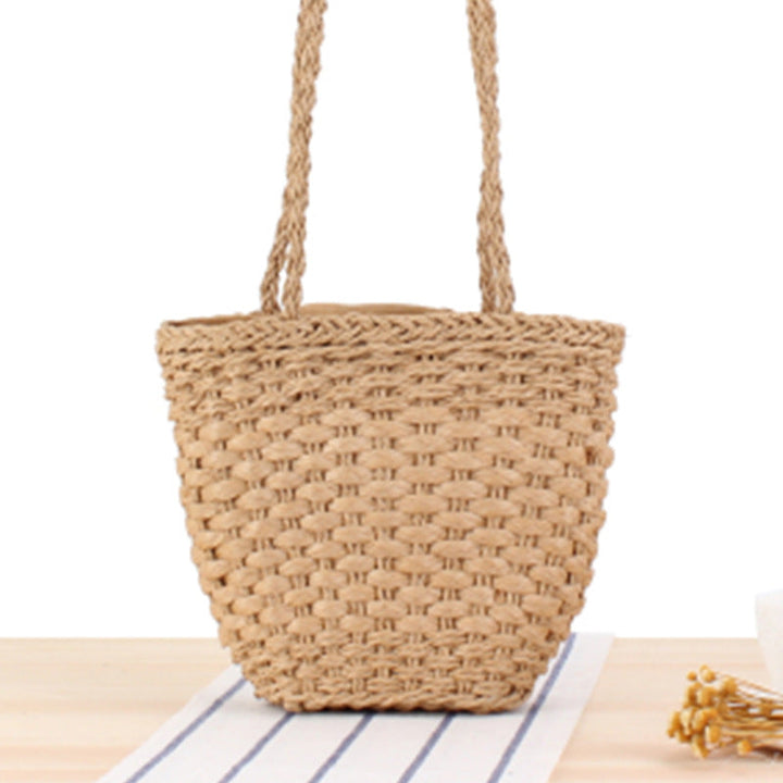 Braided handbag made of natural raffia with robust carrying straps Kalsten