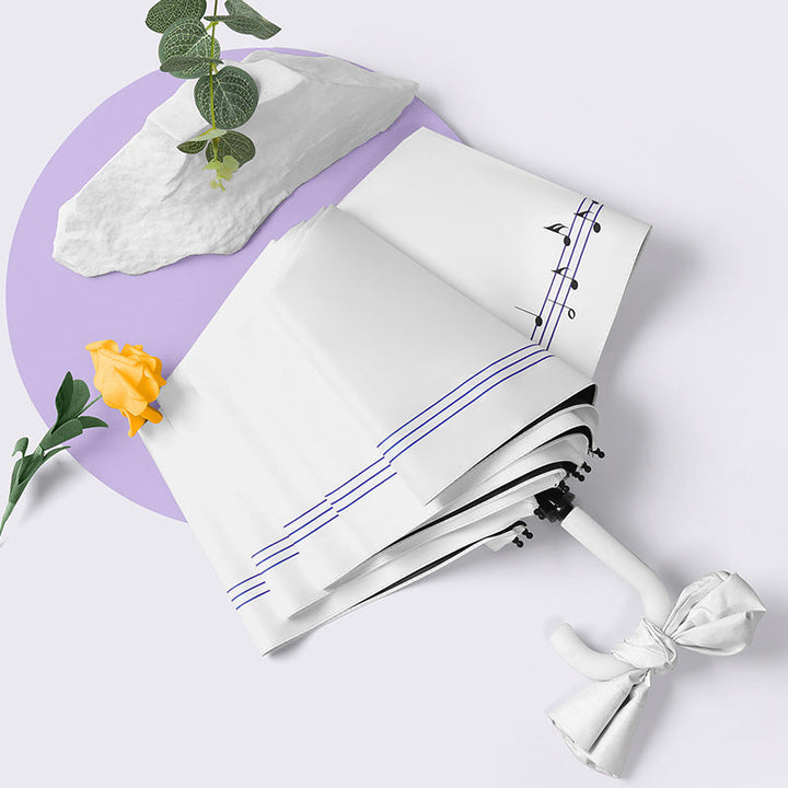 Ladies elegant folding umbrella with heart-shaped design Kalsten