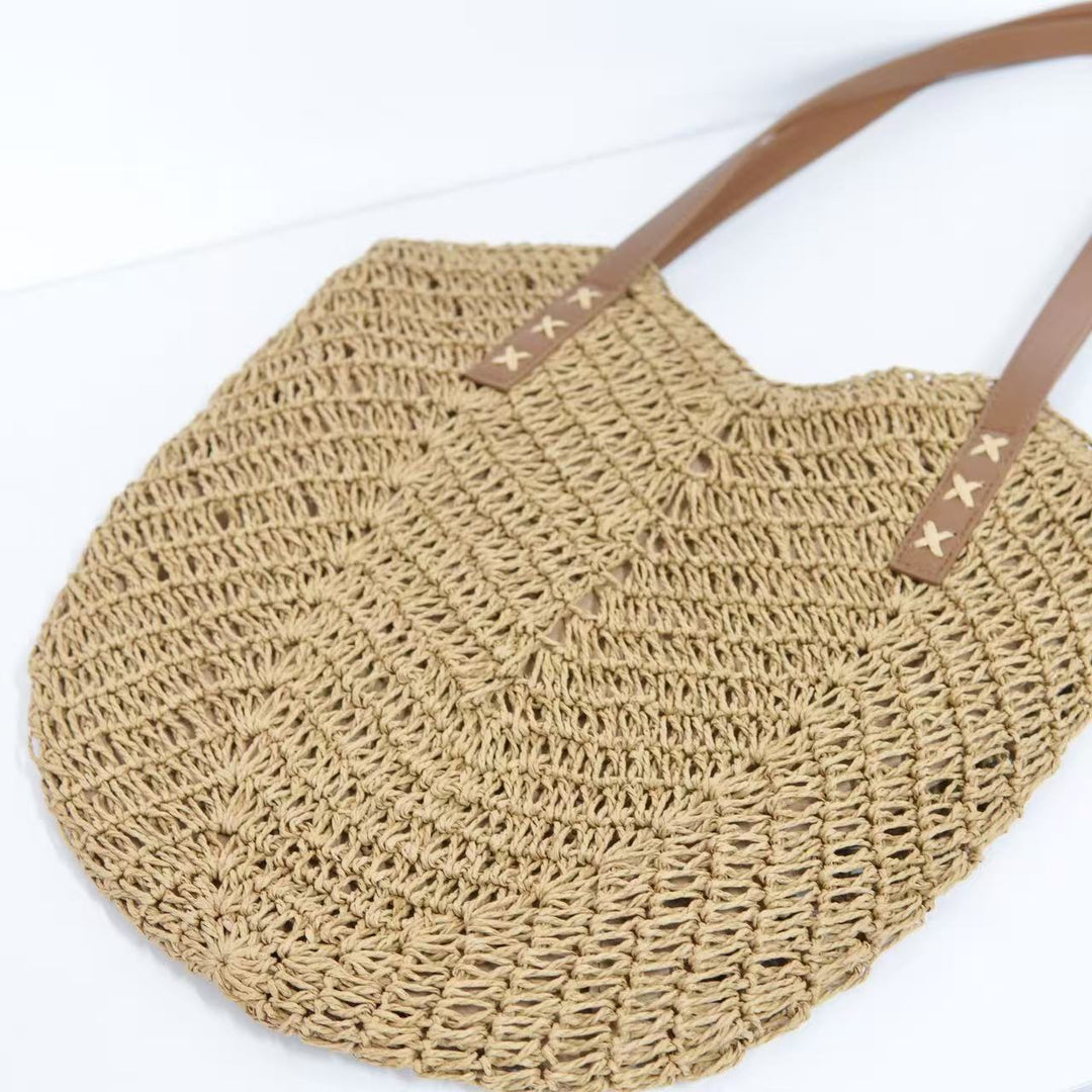 Beach bag with mesh structure and tassel details Kalsten