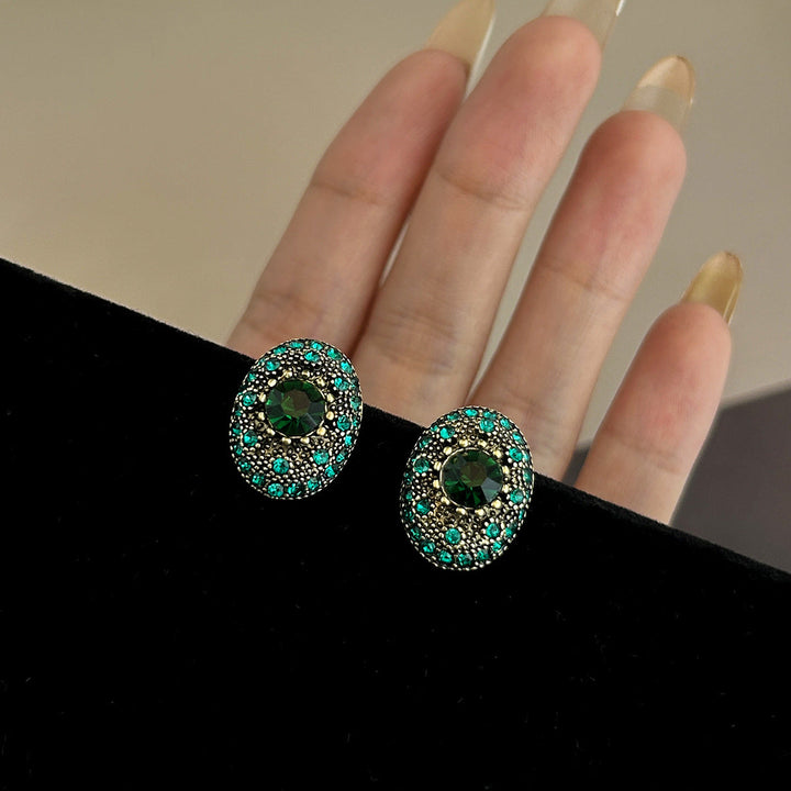 Sparkling stud earrings with intricate details Kalsten