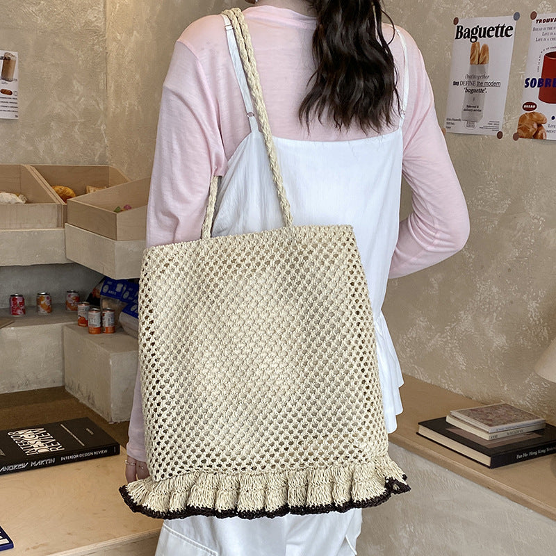 Handcrafted straw bag with fringed hem Kalsten