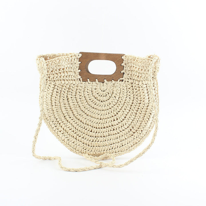 Handbag made of hand-woven natural material with stylish wooden handle Kalsten