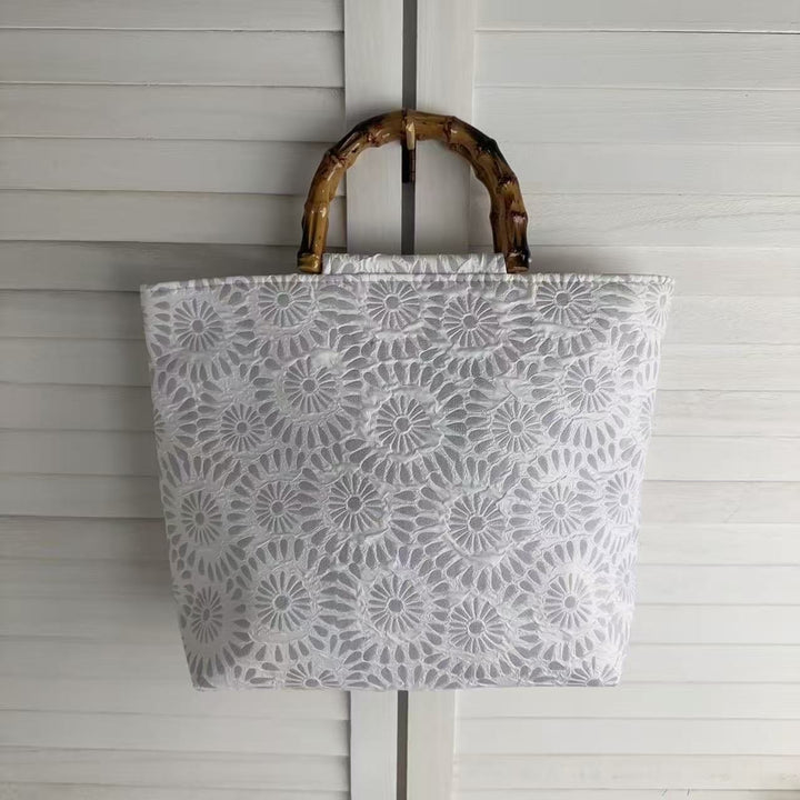 Exclusive and handcrafted beach bag with bamboo handles Kalsten