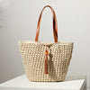 Handcrafted basket bag with fashionable tassel detail Kalsten