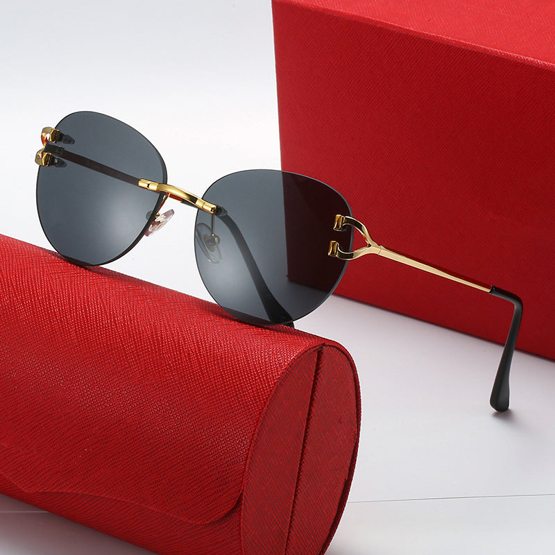 Ladies elegant Cat-Eye sunglasses with gold accents and UV protection Kalsten