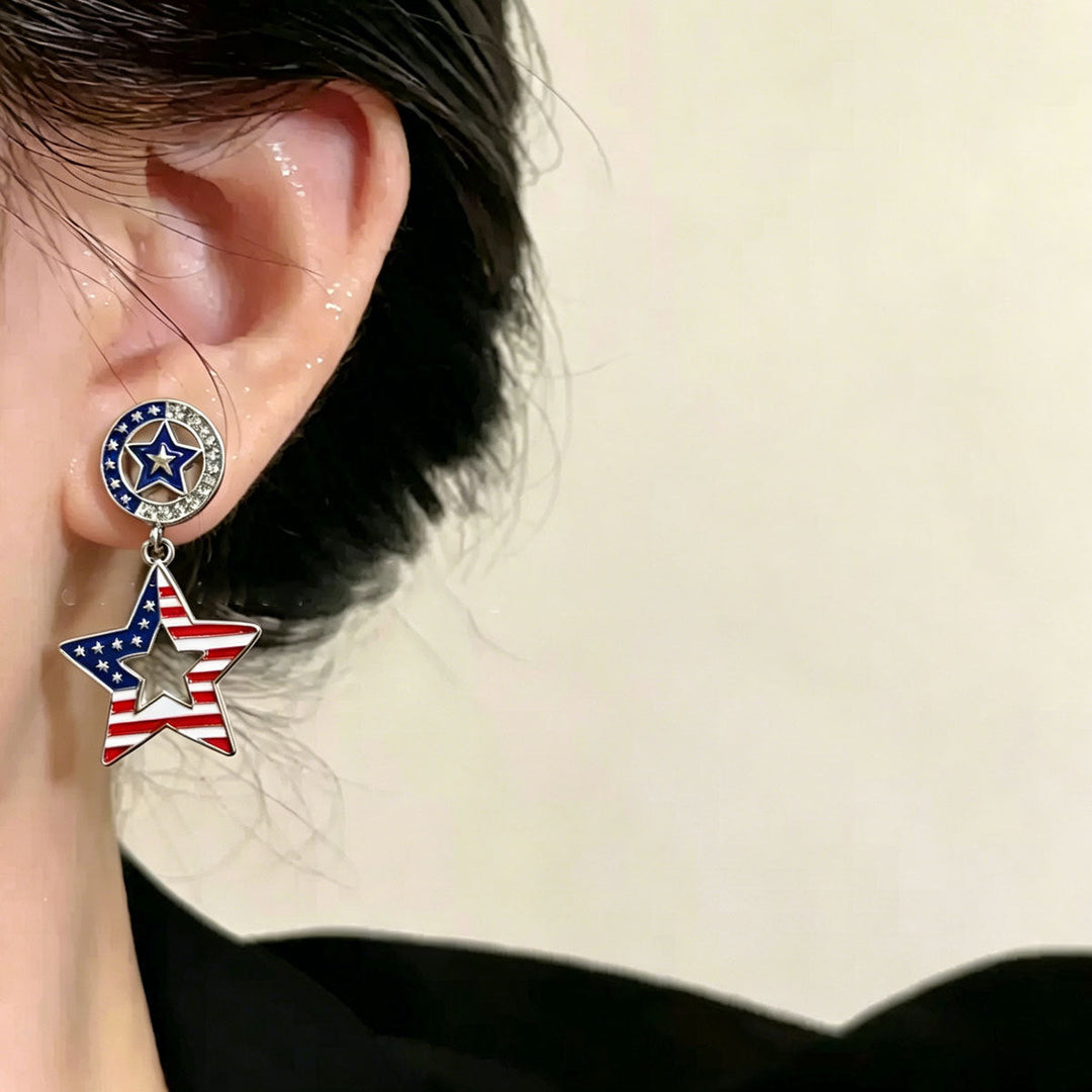 Ladies hanging earrings with star pendant and enamel flag motif Kalsten