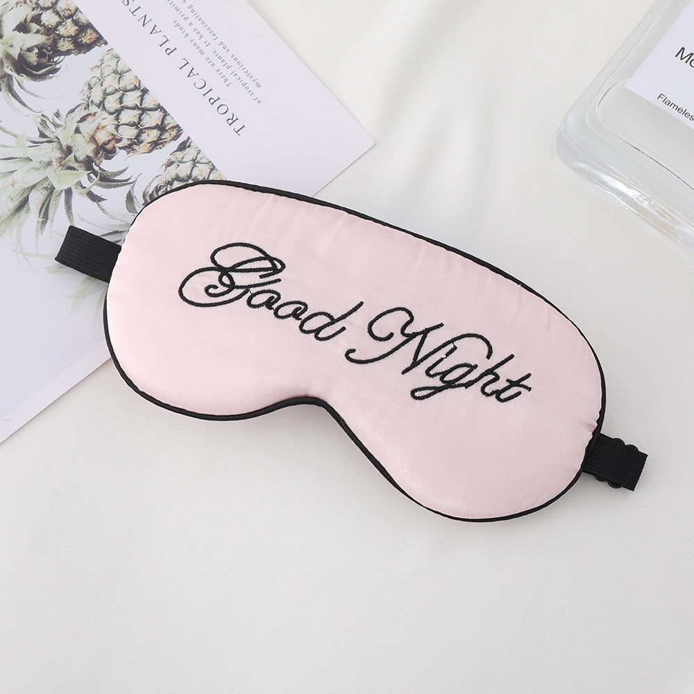 Unisex embroidered contoured sleep mask with decorative text embroidery and adjustable elastic band Kalsten