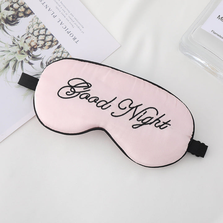 Unisex embroidered contoured sleep mask with decorative text embroidery and adjustable elastic band Kalsten