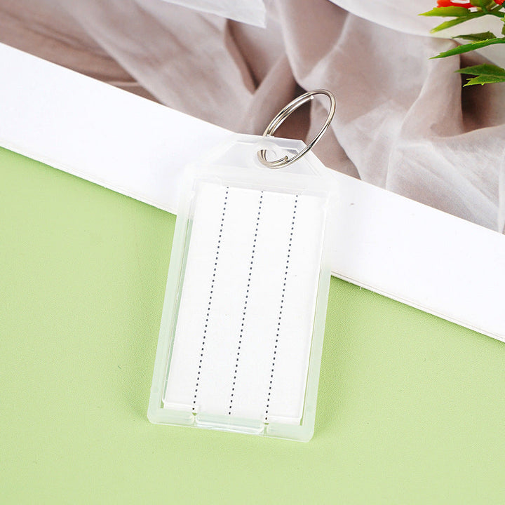 Unisex label tag with transparent sleeve and three writable fields Kalsten