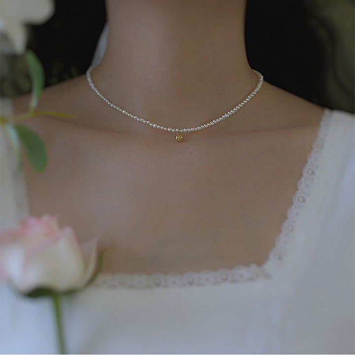 Delicate pearl necklace with elegant gold accent chain Kalsten