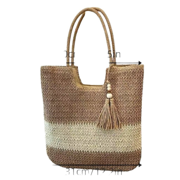 Handbag made of braided natural material with tassel details Kalsten