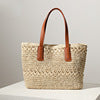 Braided straw bag with sturdy leather handles Kalsten