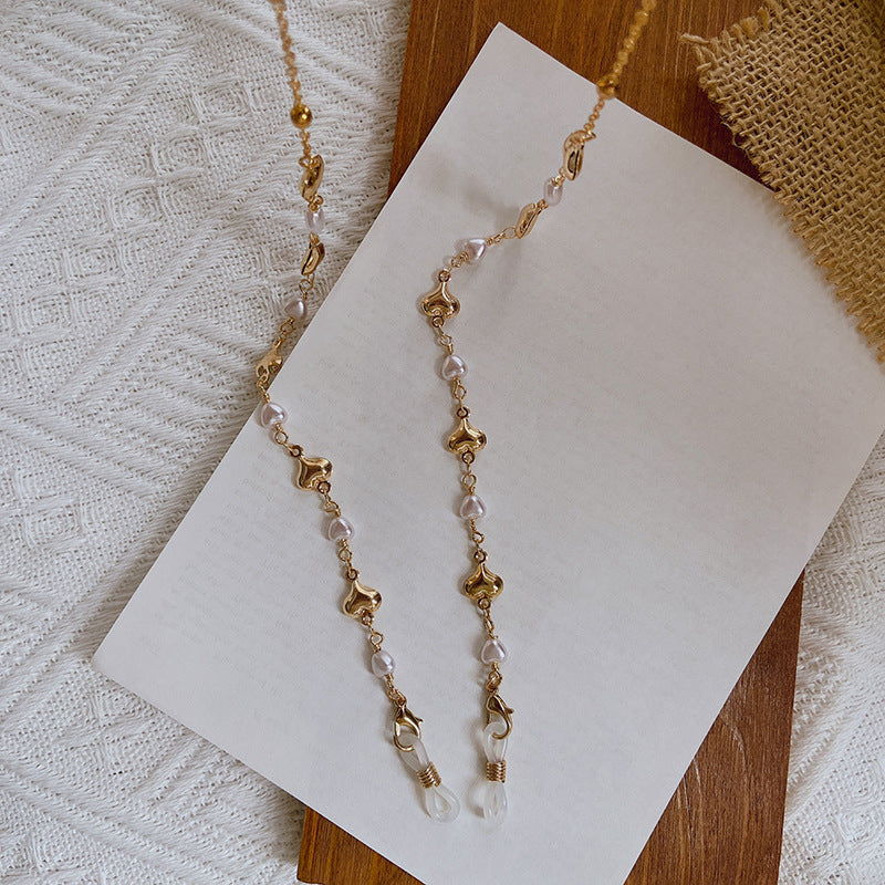Fashionable necklace with pearls and golden accents Kalsten