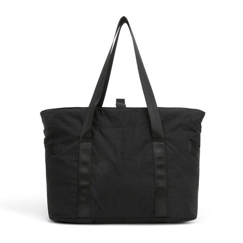 Stylish tote bag with spacious main compartment and reinforced handles Kalsten