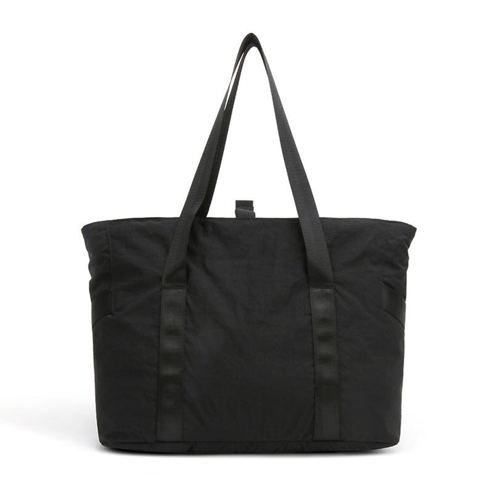 Stylish tote bag with spacious main compartment and reinforced handles Kalsten