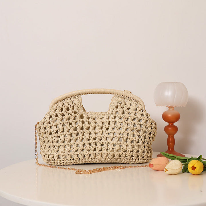 Handcrafted rattan bag with elegant handles and chain straps Kalsten
