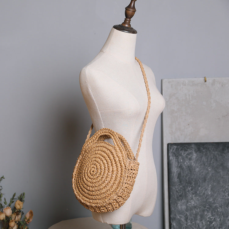 Handcrafted Round Wicker Bag with Elegant Closure Kalsten
