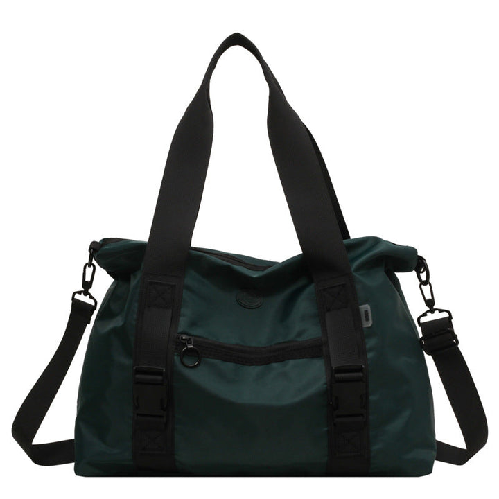 Spacious sports duffel bag with ergonomic carrying handles and water-repellent material Kalsten