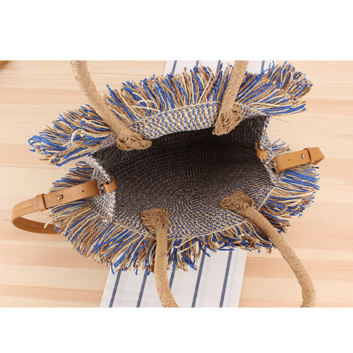 Round Bast shoulder bag with fringes and leather handles Kalsten