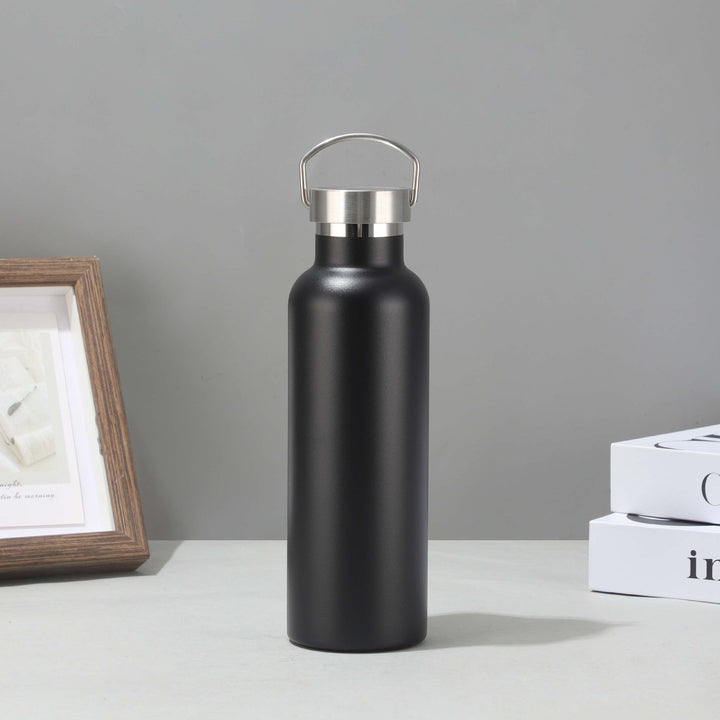 Women's stainless steel insulated drinking bottle with sustainable bamboo lid Kalsten