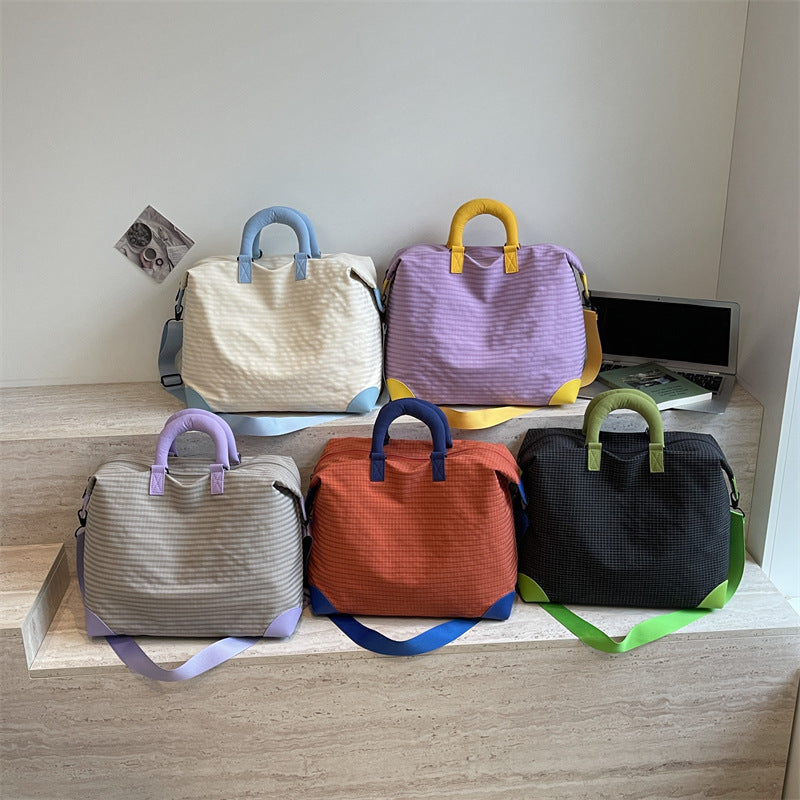 Fashionable Travel Bag with Ergonomic Carrying Strap and Structured Interior Kalsten