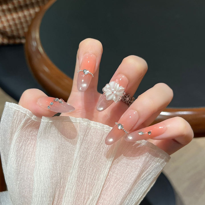 Elegant Nail Art Extensions with Pearl Accents Kalsten
