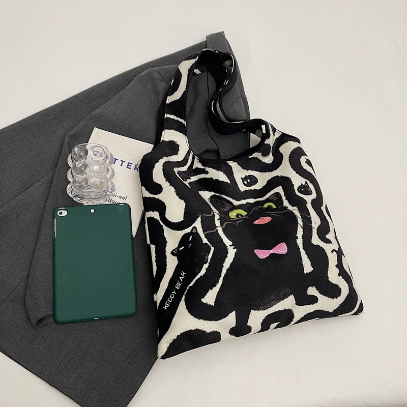 Shoulder bag with playful cat motif Kalsten