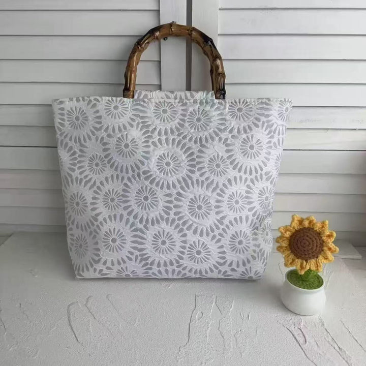 Exclusive and handcrafted beach bag with bamboo handles Kalsten