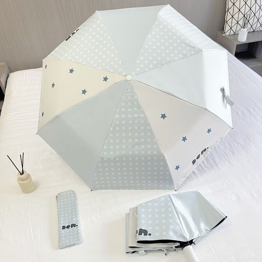 Women's folding umbrella with unique star pattern and practical carrying bag Kalsten
