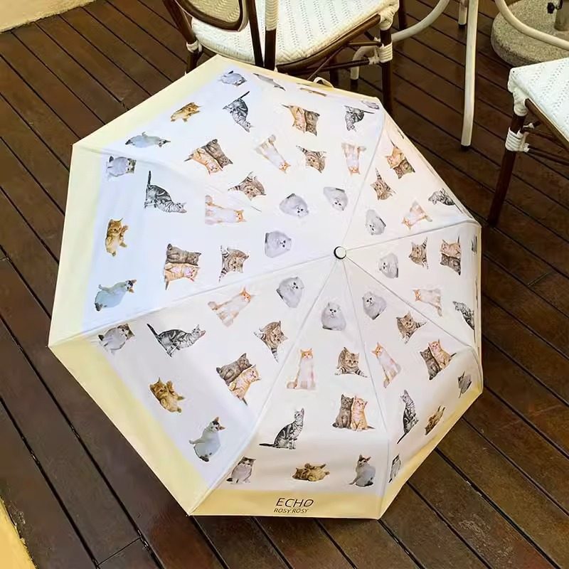 Ladies folding umbrella with playful animal design Kalsten