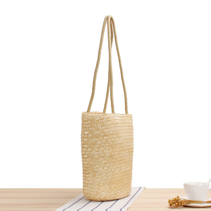Shoulder bag made of braided natural material with long shoulder straps Kalsten