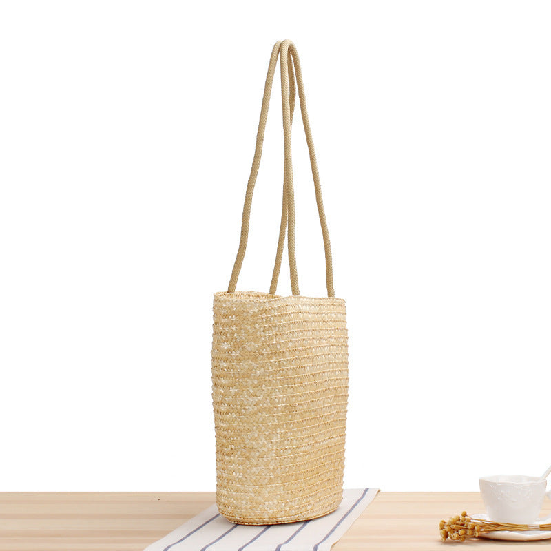 Handcrafted straw bag with long handles Kalsten