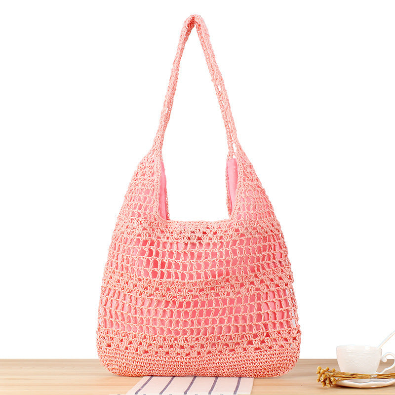 Handbag with floral appliqué Made of natural material Kalsten
