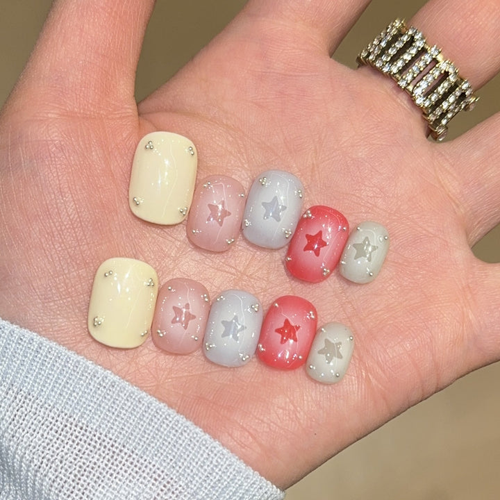 Artificial nails with sparkling star motifs Kalsten