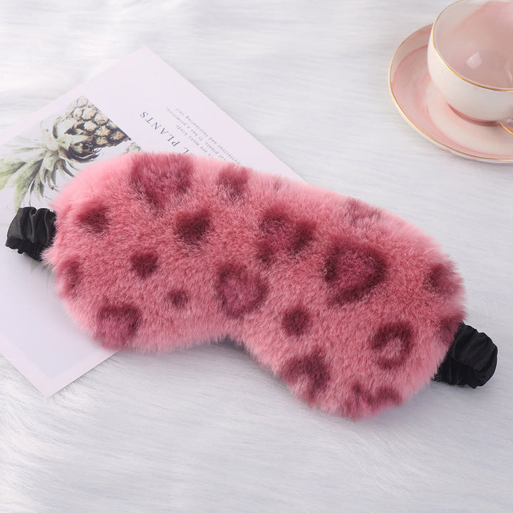 Women's cuddly faux fur sleep mask with heart-embossed surface and gathered comfort band Kalsten