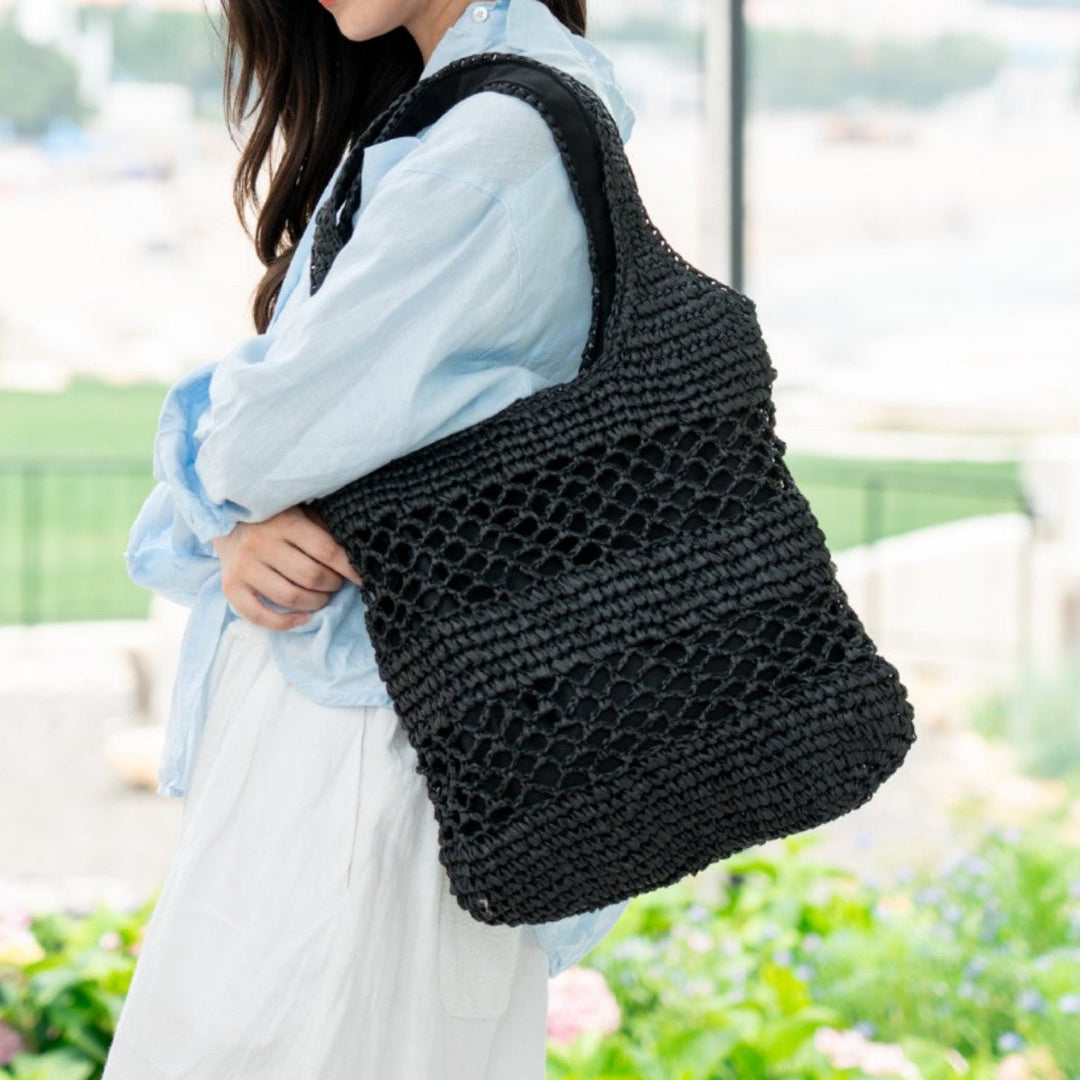 Handwoven beach bag with open mesh structure Kalsten