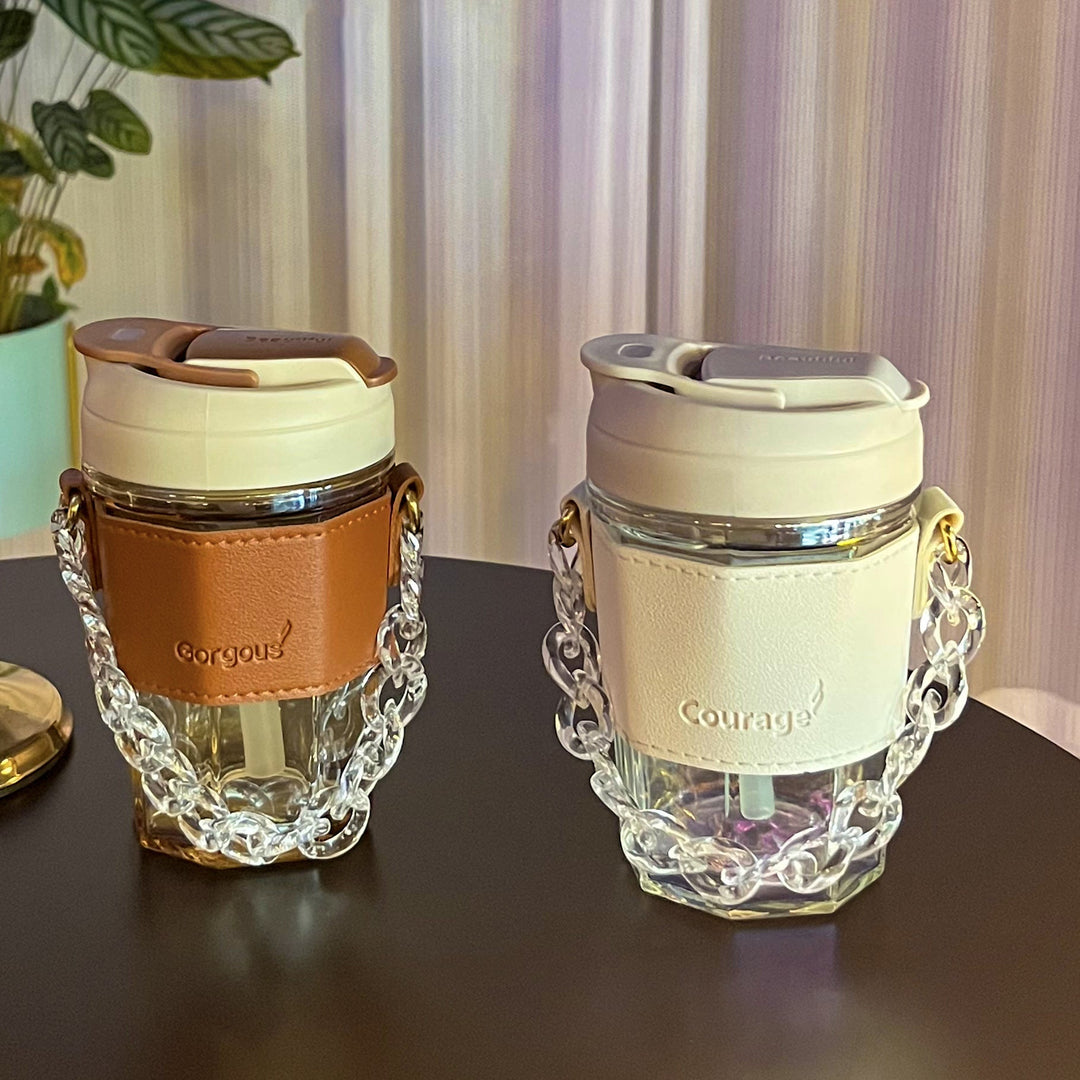 Women drinking cup with elegant leather handle and practical carrying chain Kalsten