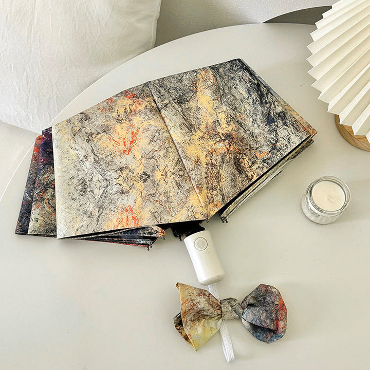 Ladies elegant folding umbrella with unique marble pattern Kalsten