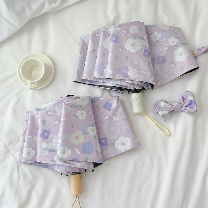 Women's Automatic Folding Umbrella with Floral Design and Practical Storage System Kalsten