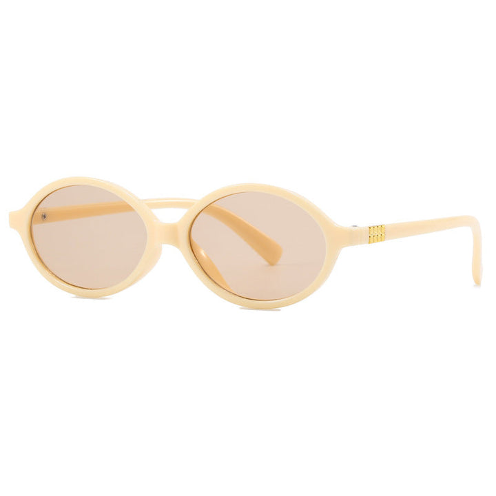 Women's fashionable sunglasses with oval frame and golden accents Kalsten