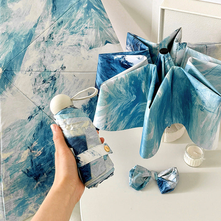 Ladies elegant folding umbrella with unique marble pattern Kalsten